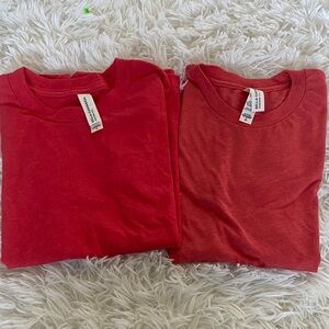 2 youth small Bella canvas shirts